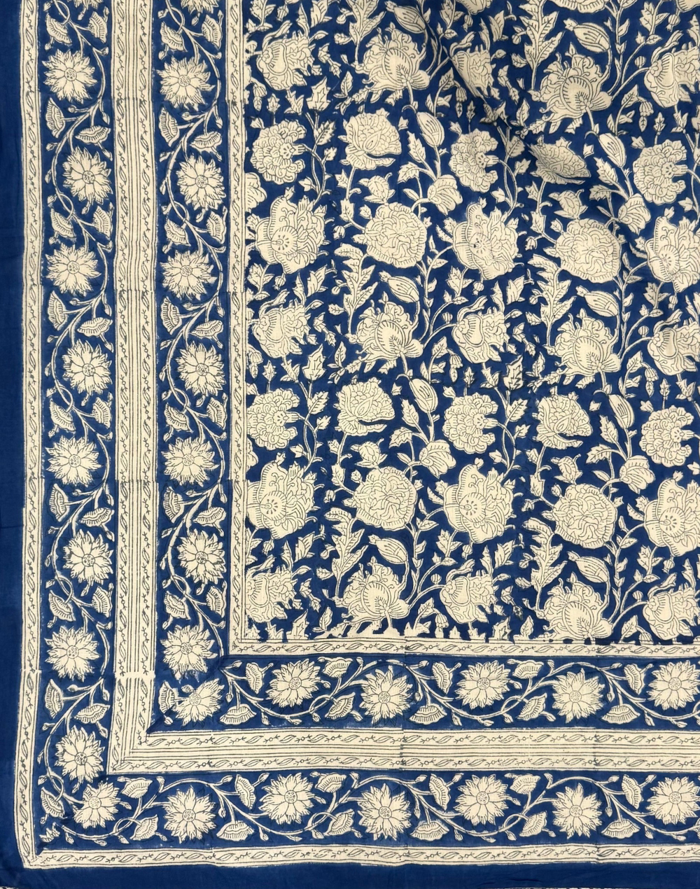 Blue fabric with white floral pattern
